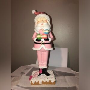 💕 pink Santa Claus figurine carrying macaroons